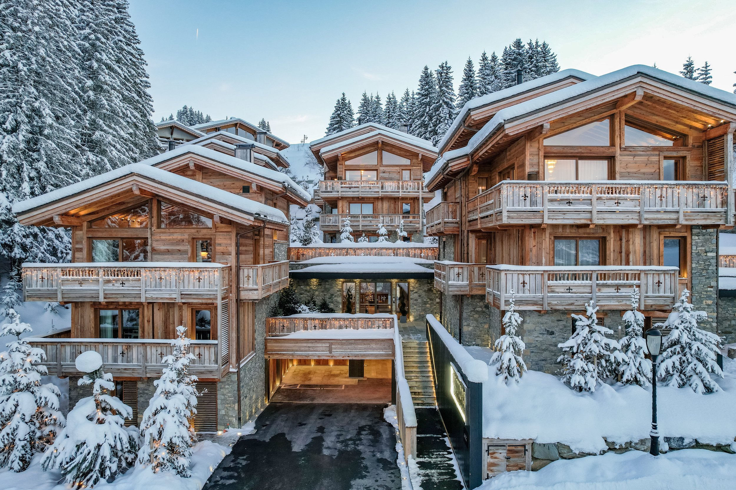 A mountain chalet at night in the snow