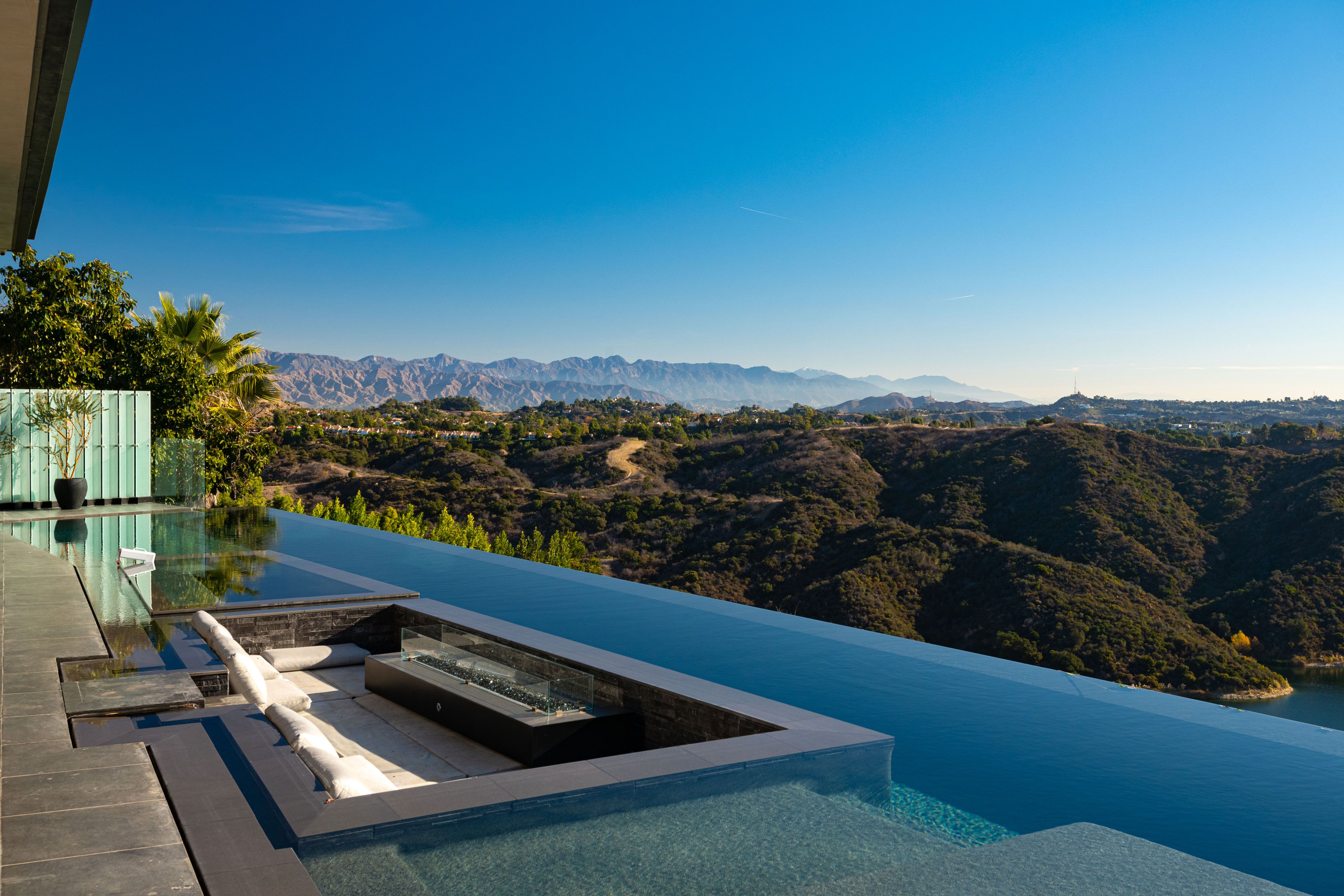 A villa with an infinity pool facing the sea